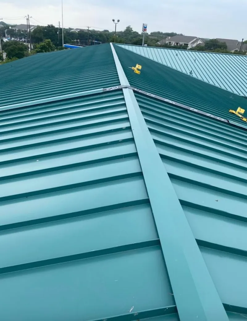Green commercial metal roof ridge and valley for Metal Roof Repair in Lenexa