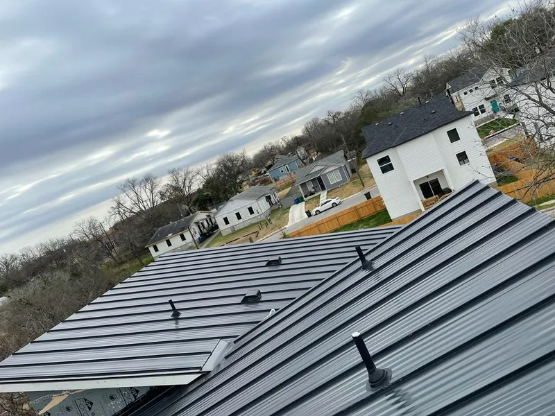 Standing seam metal roof panels with vents for Skylight Repair in Lenexa